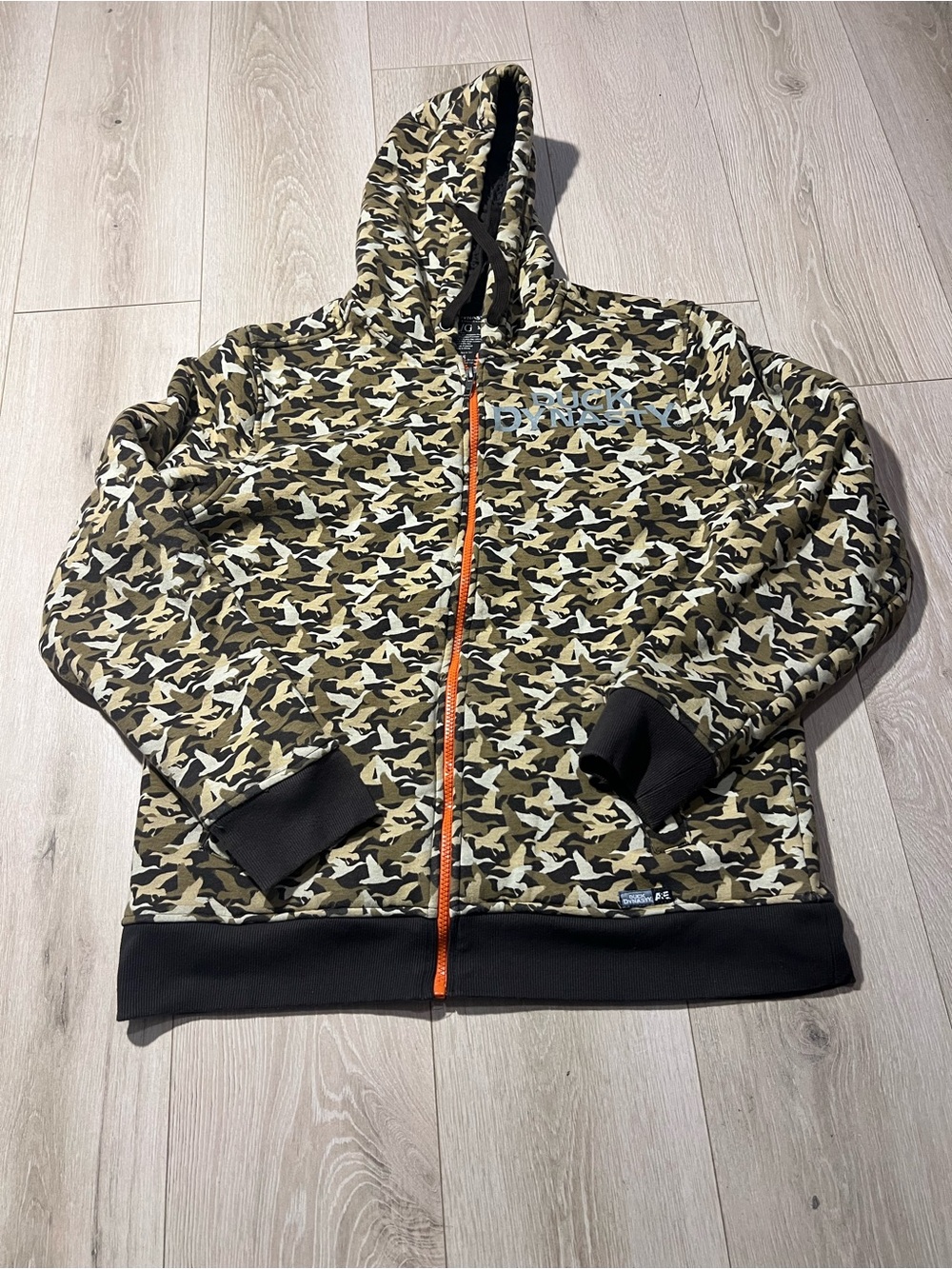 Men's Performance Camo Zip-Up Hoodie in Green with Orange Zipper